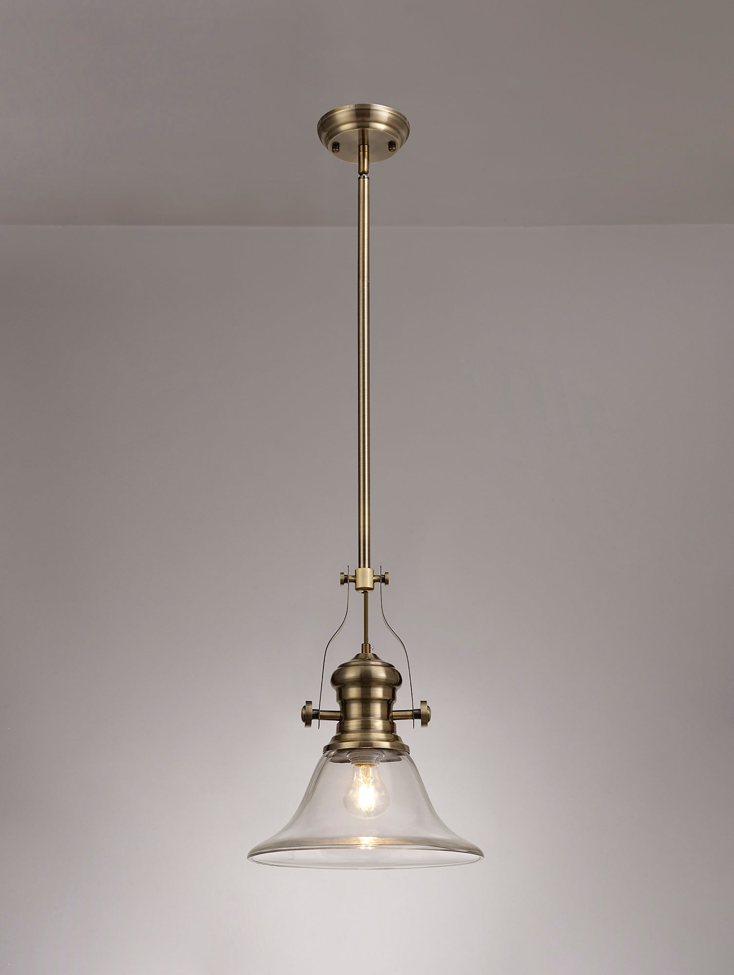 Docker 1 Light Pendant E27 With 30cm Smooth Bell Glass Shade, Antique Brass/Clear